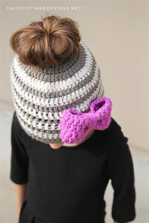 This knitted bun hat is a combination of a hat and a headband with an opening on top for your hair. 10 Easy Messy Bun Hat Patterns Crochet & Knit - Tip Junkie