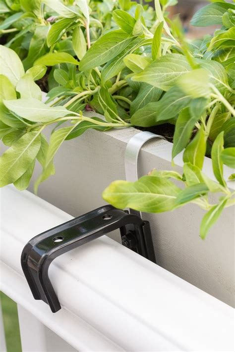 This planter is great for home or apartment use and helps you make the most of your porch or patio. DIY Railing Planter Box | Deck railing planters, Railing ...
