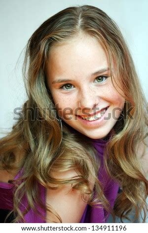 With the fashion world trends changing every other season. A Beautiful Blond-Haired 13-Years Old Girl, Portrait Stock Photo 134911196 : Shutterstock