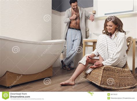 This information might be about you, your preferences or your device and is mostly used to make the site work as you expect it to. Couple In The Bathroom Stock Image - Image: 30179121