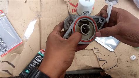 Antaranya ialah pengumpulan kekotoran akibat habuk dan bahan kotor tersumbat di dalam penapis minyak enjin. ENJIN KEliSA/KENARI LEAKING MINYAK HITAM Di OIL FILTER ...