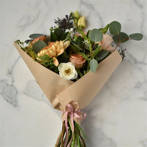 We are inspired by nature and are committed to reducing our waste and recycling. Hand-tied Bouquet in Kraft Paper from Coriander Girl ...