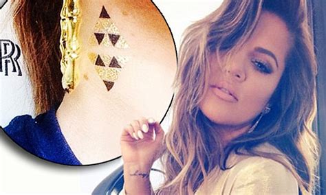 A tattoo on her hand of his initials. Khloe Kardashian gets temporary neck tattoo but still hasn ...