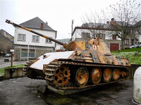 According to statements by veterans of the 116th pd and residents the tank fell over due to detonation pressure by dropped bombs into the ourthe and landed on the tower. BSMC Lier-Putte, 08.12 2013 - trip to the Ardennes and the ...