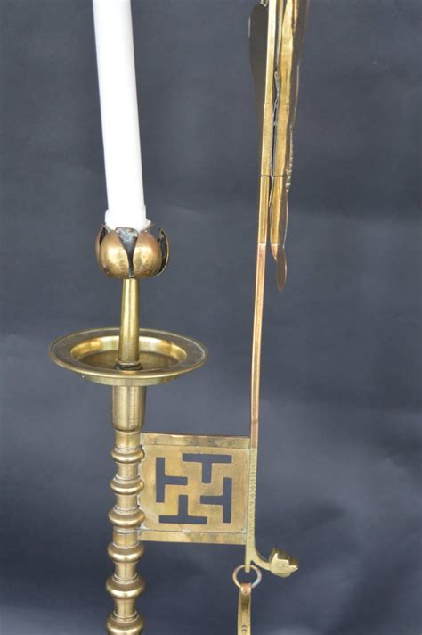 You've stuck a toothpick, knife or something else into your candle holder to try and pry that hardened wax out of your holder! Pair of Brass Butterfly Candlesticks For Sale at 1stdibs