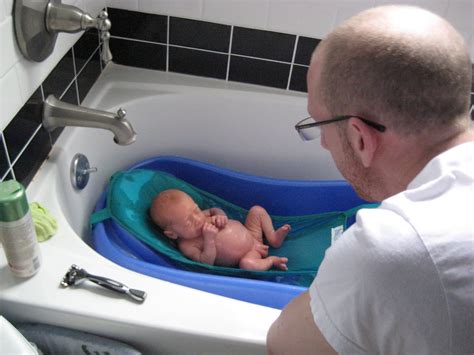 I recommend doing the first bath in the sink so that baby is at counter height for you. Team Lovebo: First Bath!