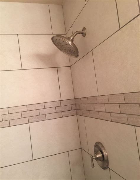 After a hard day at work, everybody likes to stand under a warm shower for a few minutes. Moen Shower head | Moen shower head, Blue mosaic tile ...