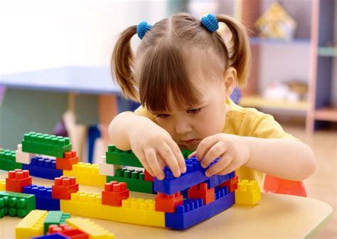 Two stunning teens play a strip memory game. Learn About LEGO Therapy for Children With Autism