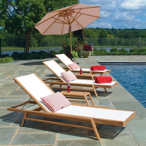 Relax and recline in one of our designer lounge chairs. Summit stacking chaise in Cloud. | Teak chaise lounge ...