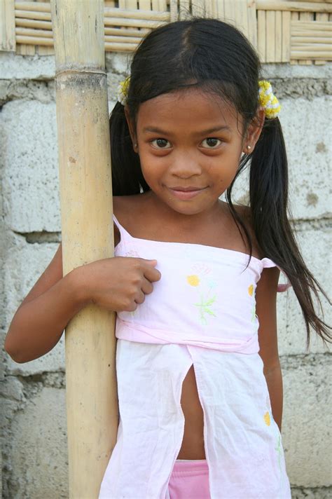 A person from the continent of asia. Asia - Philippines / Luzzon - preteen Philippine girl - a ...