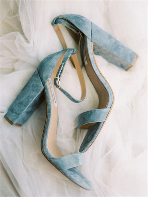 Maybe you would like to learn more about one of these? Light blue velvet high heels photographed by Alex Thornton ...