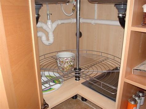 Hide sponges, rubber gloves, paper towels, and more in this nifty design. Ikea corner lazy susan and sink plumbing | Corner sink ...