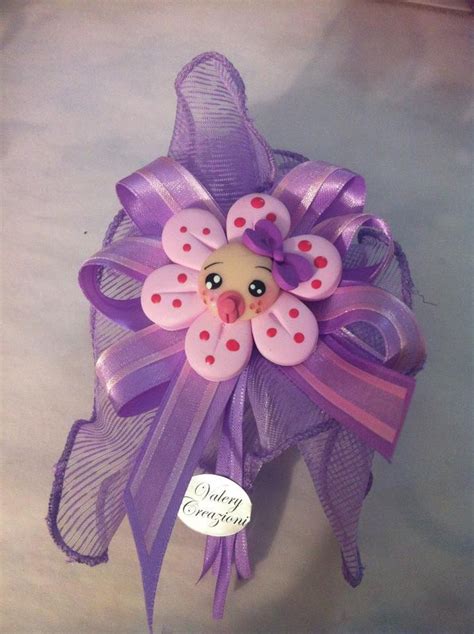 Spero che sarà abbastanza semplice e chiaro! bomboniera sacchetto fiore bimba nascita in fimo ...
