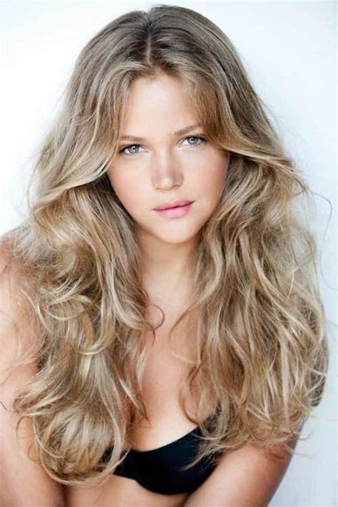 Curly hair is perfect for making a statement. Blonde curly hairstyles for long hair - Xpicse.com