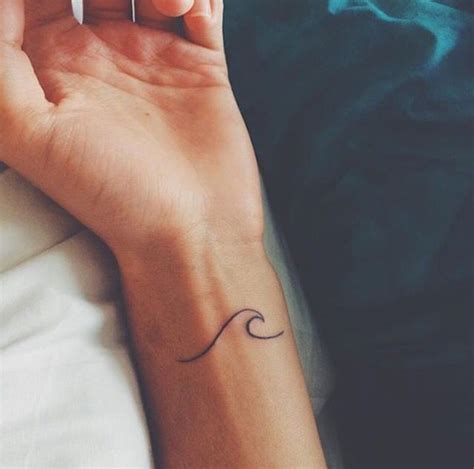 You can also add other images to your whale tattoo. 26 Super Simple Wave Tattoo Designs - TattooBlend