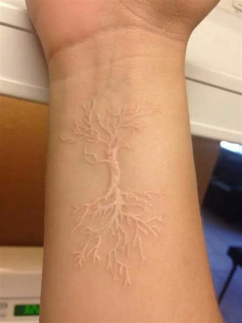 Maybe you would like to learn more about one of these? White inked tree tattoo with roots | www.otziapp.com ...