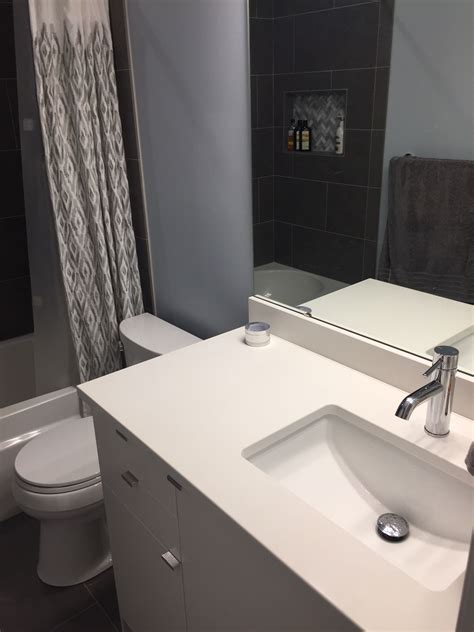 Gbi tile & stone inc. Lowes mitte gray tile guest bath with IKEA cabinets | Ikea ...