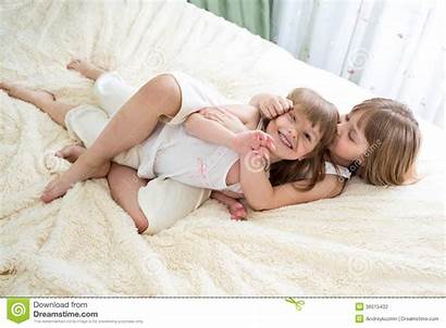Kissing Sisters Hugging Bed Happy Wake Morning