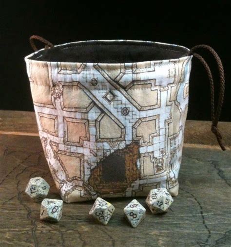 This diy dice bag was made out of an old shirt and a shoelace. Dice Bags | Dice bag, Bags, Diy projects