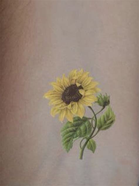 Small sunflower on wrist tattoo. Pin on Tattoo