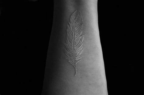 See more ideas about feather tattoos, tattoos, body art tattoos. white-ink-feather-tattoo-design - Design of TattoosDesign ...