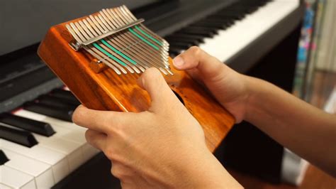How are the notes played in kalimba tabs? You are my sunshine - Kalimba - YouTube