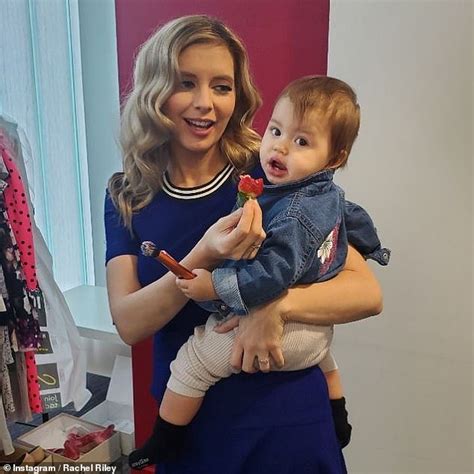 Edition of the reality tv series big brother, winning season 13 in 2011. Rachel Riley feeds her baby daughter Maven strawberries at ...