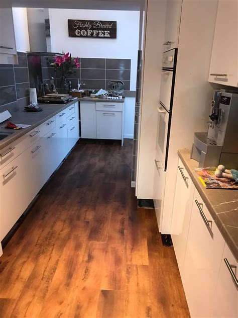 Karndean specialise in, and have become leading suppliers of luxury karndean's vinyl flooring accurately replicates the look of natural products like wood and stone. Kitchen installation of Karndean Smoked Oak | Kitchen ...