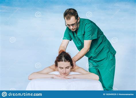 Massage therapy techniques deep tissue hot oil japanese back. Massage Therapist Doing Massage Therapy Of A Young Woman ...