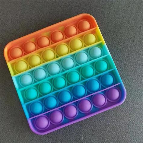 Fidget toys like pop its have been used by health care professionals as a way of helping children who have anxiety or sensory difficulties. RAINBOW SQUARE POP IT — Learning Express Gifts of NC