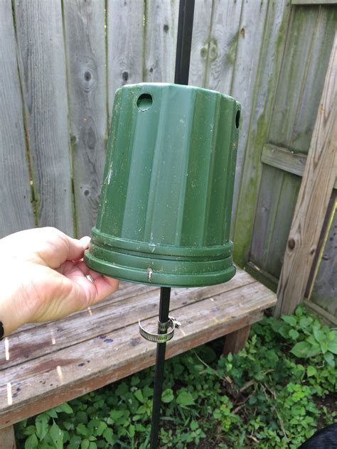 The best diy bird feeders give your garden a facelift. Chipmunk-baffle for bird feeder pole, made from reused empty plant pot and hose clamp. Works ...