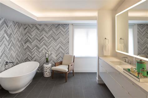 Reiner says cork flooring is the best for allergy sufferers because it's both naturally antimicrobial and fire retardant. Herringbone Tile Wall Uplifts Modern Master Bathroom | HGTV