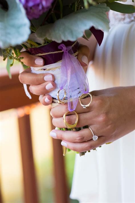 Pictures of bridal bouquets with wedding rings. Brides grandparents rings tied on bouquet | Jewelry ...