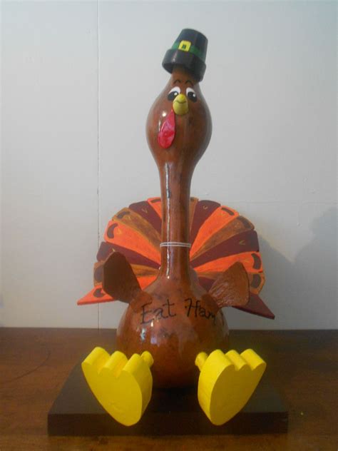 Maybe you would like to learn more about one of these? Thanksgiving turkey gourd with wooden tail feathers and ...