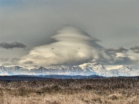 Sign up for free today! Lenticular clouds over the mountains | After seeing very ...