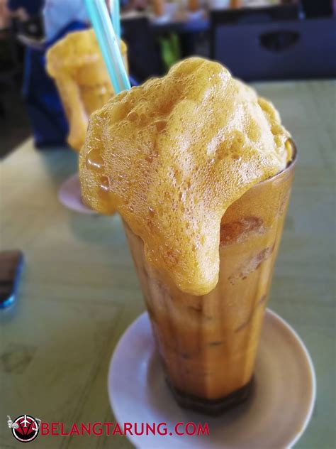 Lebih menjurus kepada teh ais 'gunung berapi' yang sedang galak mengeluarkan laharnya ke permukaan bumi, ironinya ia sejuk. Teh Tarik Madu Ais dan Sup Ikan Warung Pak Mat Pulau ...