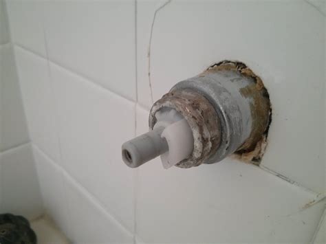 Turn off the water to your faucet and remove the handle (fig. plumbing - How to remove bathtub faucet cartridge? - Home ...