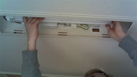 Remove existing fluorescent tubes and ballast cover. Fluorescent bulb and ballast change - YouTube