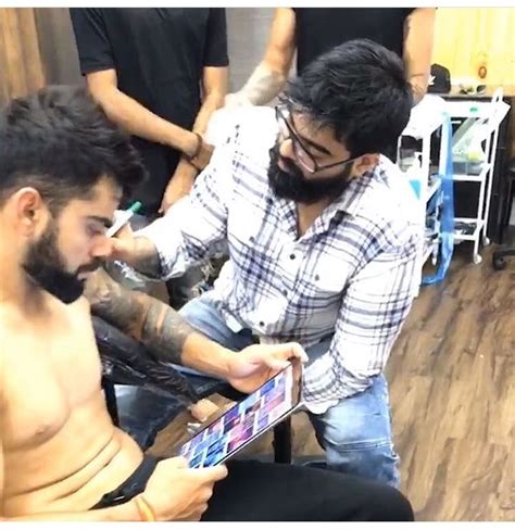 Check spelling or type a new query. Virat Kohli getting his Tattoos detailed at Bandra, Mumbai ...