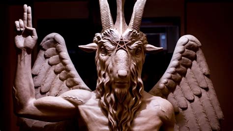 Decoding the symbols on Satan's statue - BBC News