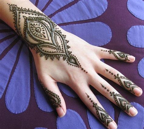 We offers flower bracelet tattoos products. Henna Mehndi tattoo designs idea for wrist - Tattoos Art Ideas