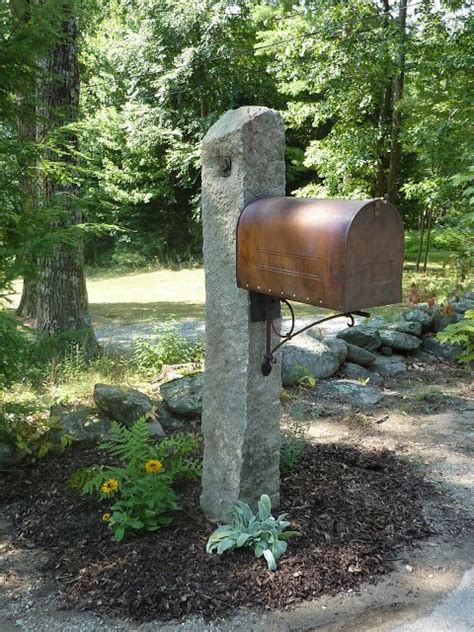 The mailbox is extremely simple in a black square. the mailbox is awaiting your letters! | Stone mailbox ...