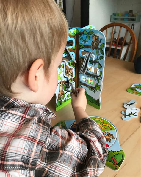 The wiggle & giggle game prompting players to do simple movements such as balancing, hopping and marching together. Review: Cheeky Monkeys Game AD - The Bear & The Fox