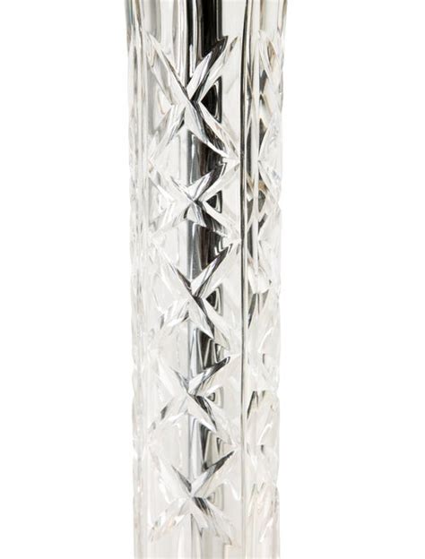 The floor lamp is fitted with an abundance of different crystals with small lights in between them, providing a unique and classy detail. Waterford Crystal Kinsale Floor Lamp - Lighting - W5W25008 | The RealReal