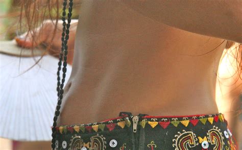 I can say that i know quite a few women with a happy trail but sorry i do not know how to remove it without irritation as of yet. Belly Woman | Woman's mid-riff belly with beads and fan ...