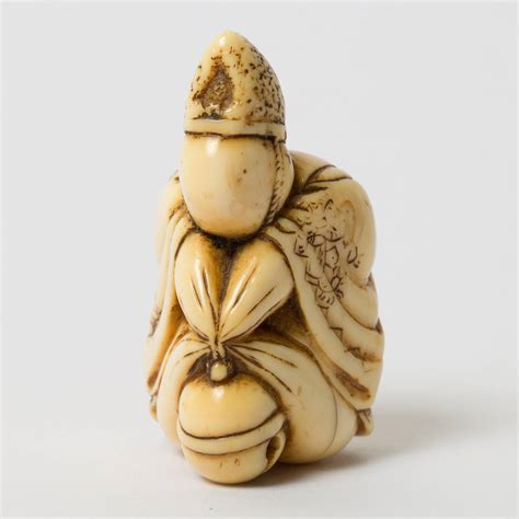 This pen is real gold, and that's an antique jade netsuke. An ivory netsuke of a saru ningyo (monkey doll) | GIUSEPPE ...