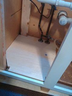 Replace kitchen sink cabinet floor. How to Replace a Sink Base Cabinet Floor | Diy kitchen ...