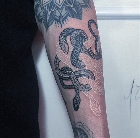 A snake tattoo is one of the coolest and most badass designs out there. #mirkosata (With images) | Snake tattoo, Tattoos, Beautiful tattoos