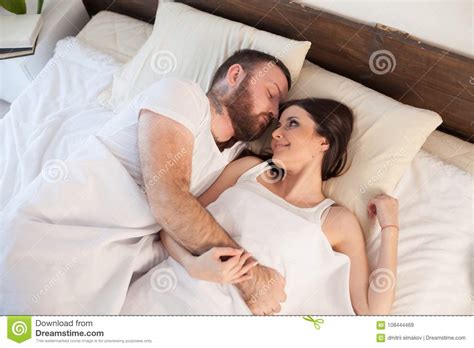 Married Couple Sleeping In The Bedroom Stock Image - Image of family, comfortable: 108444469