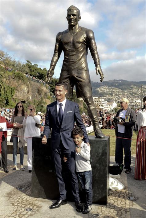 Cristiano ronaldo bust refers to jokes made about a statue that was intended to be the likeness of the statue's poor likeness of ronaldo made it the target of jokes on social media in late march, 2017. Cristiano Ronaldo Statue | Pictures | POPSUGAR Celebrity ...
